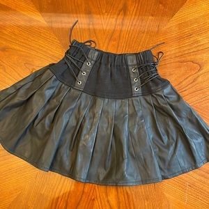 Leather Skirt with lightweight shorts underneath, leather tied on side